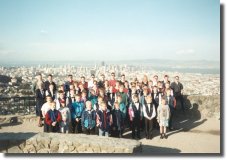 A group photo on the Twin Peaks hills. On the background the city of San Francisco.