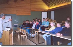 Professor Venno Laul teaching boys how to use their voice.